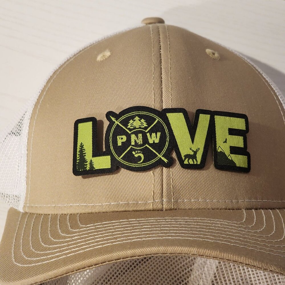 LOVE PNW Khaki/White Mesh Snapback Trucker Hat.